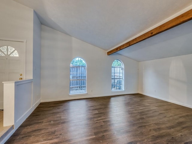 3101 Oak Hill Rd, Carrollton, TX 75007 - unfurnished living room with dark wood-style flooring and baseboards