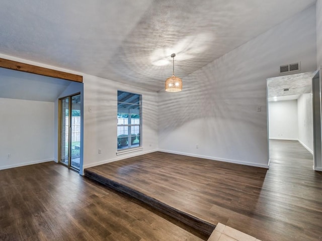 3101 Oak Hill Rd, Carrollton, TX 75007 - unfurnished room featuring wood finished floors, baseboards, and vaulted ceiling