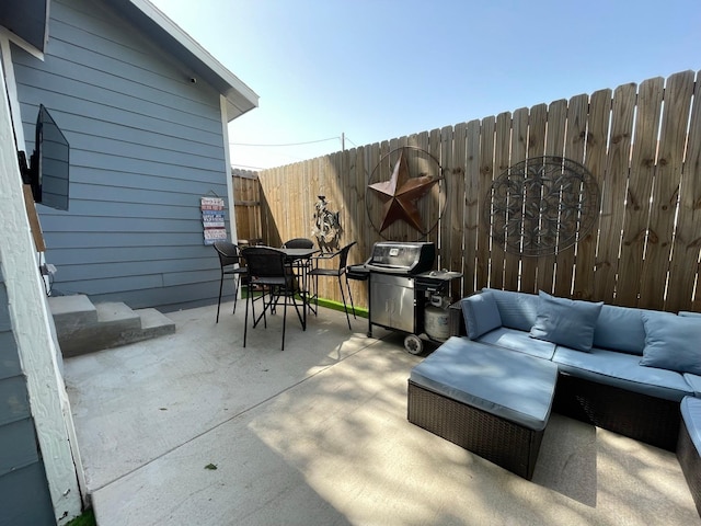 702 N Tennessee St, Mckinney, TX 75069 - fenced backyard featuring an outdoor hangout area, a patio, outdoor dining space, and a grill