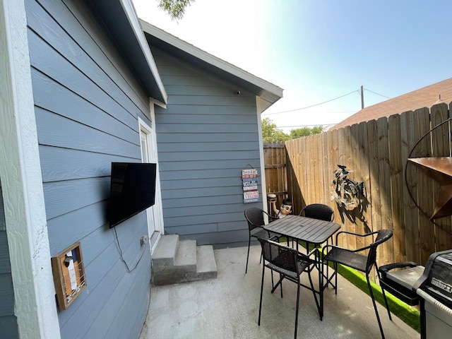 702 N Tennessee St, Mckinney, TX 75069 - view of patio / terrace featuring outdoor dining area