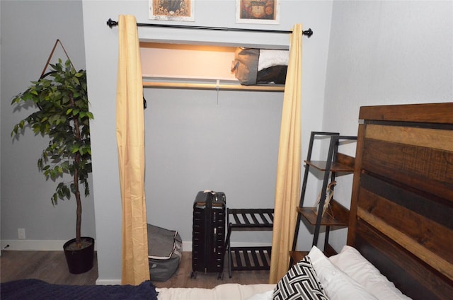 702 N Tennessee St, Mckinney, TX 75069 - bedroom featuring wood finished floors and baseboards