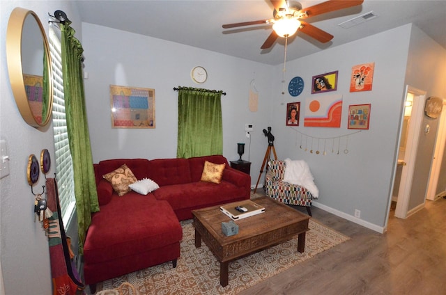 702 N Tennessee St, Mckinney, TX 75069 - living area with wood finished floors, a ceiling fan, and baseboards