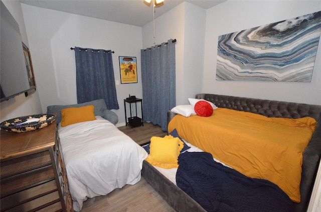 702 N Tennessee St, Mckinney, TX 75069 - bedroom with wood finished floors