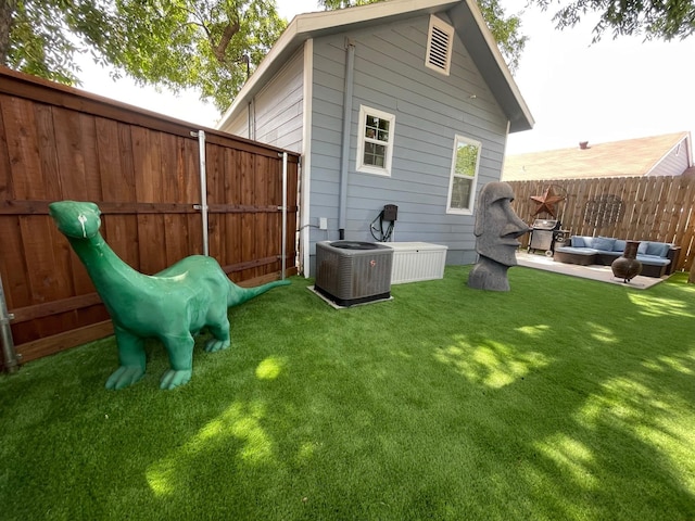 702 N Tennessee St, Mckinney, TX 75069 - rear view of house with central air condition unit and an outdoor living space