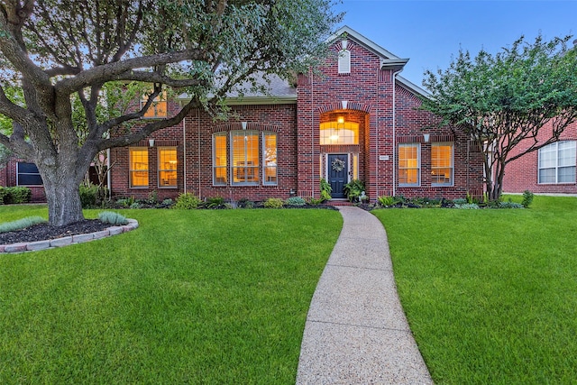 5801 Maidstone Dr, Richardson, TX 75082 - view of front of house featuring brick siding and a front yard