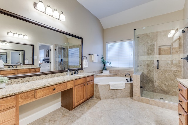 5801 Maidstone Dr, Richardson, TX 75082 - full bath featuring lofted ceiling, a garden tub, vanity, a shower stall, and tile patterned floors