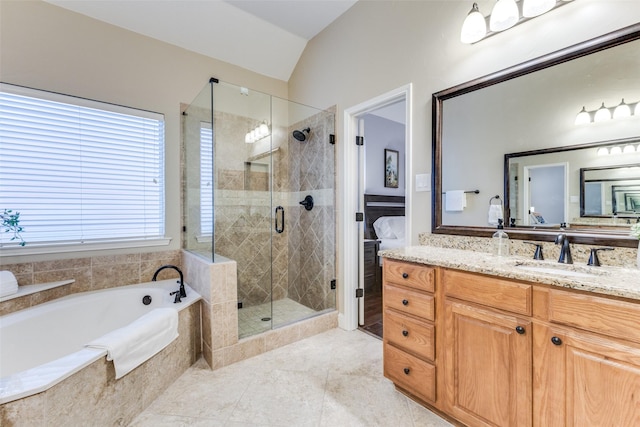5801 Maidstone Dr, Richardson, TX 75082 - bathroom with a bath, vanity, vaulted ceiling, a stall shower, and tile patterned flooring