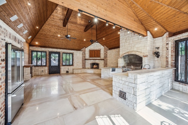 585 N Peytonville Ave, Southlake, TX 76092 - view of patio with an outdoor stone fireplace, a ceiling fan, and a sink