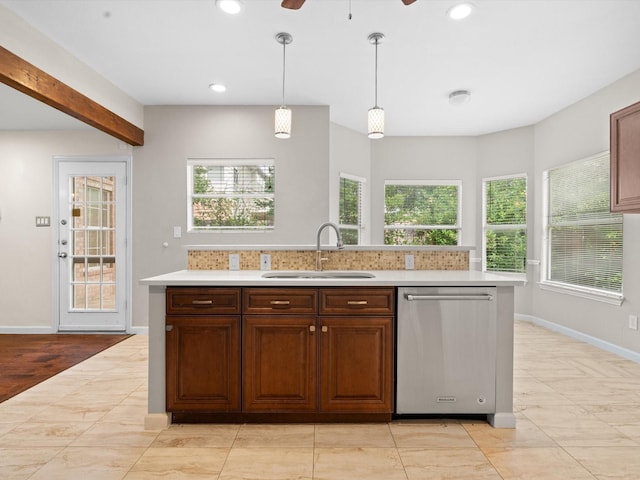 4688 Thanksgiving Ln, Plano, TX 75024 - kitchen with dishwasher, a sink, light countertops, plenty of natural light, and recessed lighting