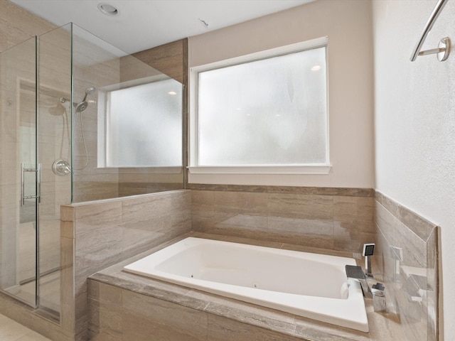 4688 Thanksgiving Ln, Plano, TX 75024 - bathroom featuring a shower stall and a jetted tub