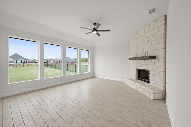 366 Paddle Boat Dr, Granbury, TX 76048 - unfurnished living room with ceiling fan, baseboards, and a stone fireplace