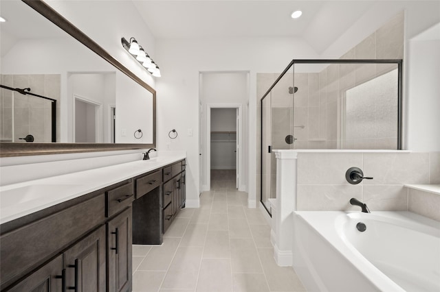 366 Paddle Boat Dr, Granbury, TX 76048 - bathroom with a shower stall, a garden tub, double vanity, tile patterned floors, and recessed lighting