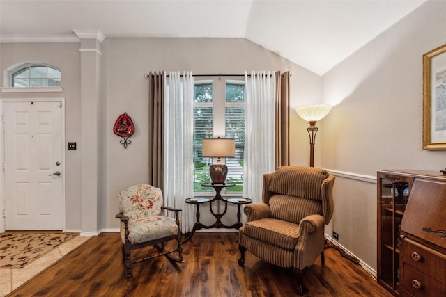 13137 Fencerow Rd, Fort Worth, TX 76244 - living area featuring wood finished floors, lofted ceiling, ornamental molding, and baseboards