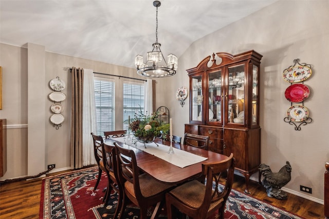 13137 Fencerow Rd, Fort Worth, TX 76244 - dining space with a chandelier, dark wood-style flooring, lofted ceiling, and baseboards