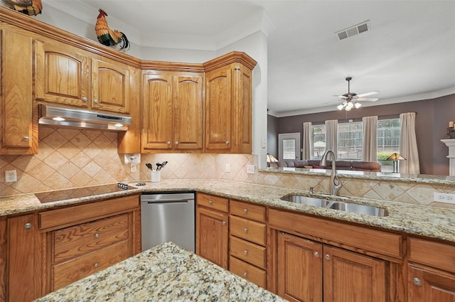 7917 Chapelwood Dr, North Richland Hills, TX 76182 - kitchen featuring under cabinet range hood, a sink, light stone countertops, ceiling fan, and black electric stovetop