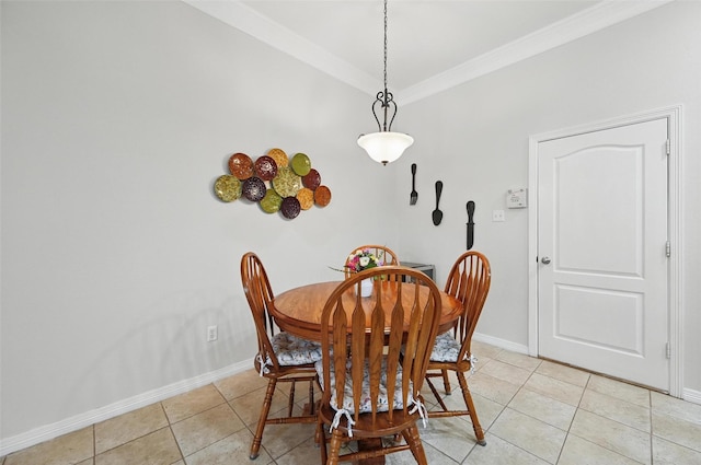 7917 Chapelwood Dr, North Richland Hills, TX 76182 - dining space featuring light tile patterned floors, baseboards, and crown molding