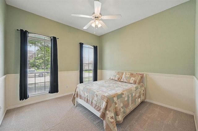 7917 Chapelwood Dr, North Richland Hills, TX 76182 - bedroom featuring multiple windows, carpet flooring, a ceiling fan, and baseboards