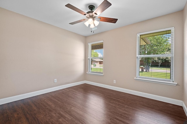 310 Singletree St, Highland Village, TX 75077 - spare room with dark wood finished floors, baseboards, and ceiling fan