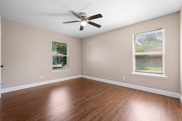 310 Singletree St, Highland Village, TX 75077 - spare room featuring dark wood-type flooring, ceiling fan, and baseboards