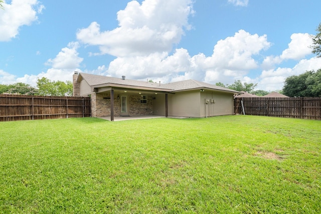 310 Singletree St, Highland Village, TX 75077 - rear view of house with a patio area and a chimney