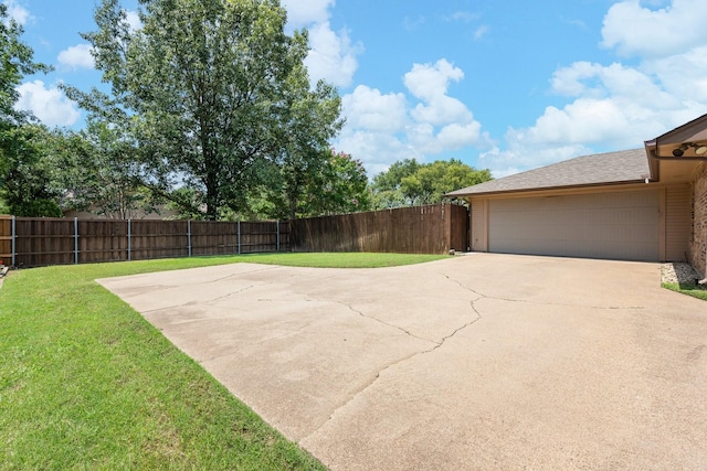 310 Singletree St, Highland Village, TX 75077 - view of yard with a garage
