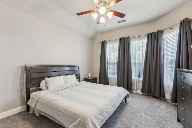 1117 Summer Ln, Mckinney, TX 75071 - bedroom featuring light colored carpet, baseboards, vaulted ceiling, and a ceiling fan