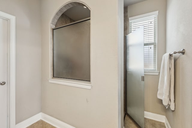 1117 Summer Ln, Mckinney, TX 75071 - bathroom with a stall shower and baseboards