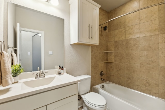1117 Summer Ln, Mckinney, TX 75071 - full bath featuring vanity, toilet, tub / shower combination, and a textured wall