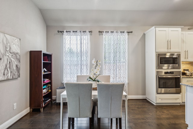 1117 Summer Ln, Mckinney, TX 75071 - dining space featuring dark wood-style floors and baseboards