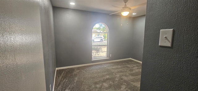 402 Ivy Way, Garland, TX 75043 - unfurnished room with a ceiling fan, carpet floors, a textured wall, and baseboards