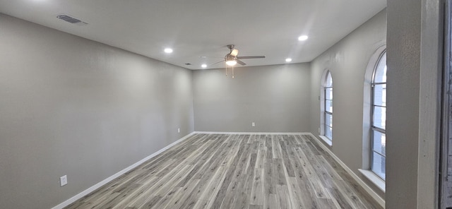 402 Ivy Way, Garland, TX 75043 - empty room with recessed lighting, light wood-style flooring, ceiling fan, and baseboards