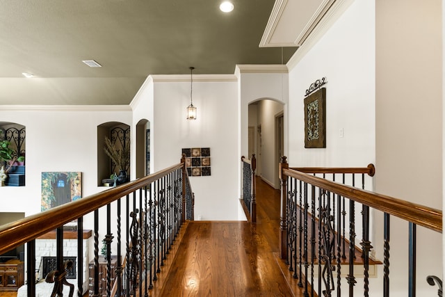 1765 Mustang Trl, Frisco, TX 75033 - corridor featuring an upstairs landing, attic access, wood finished floors, ornamental molding, and recessed lighting