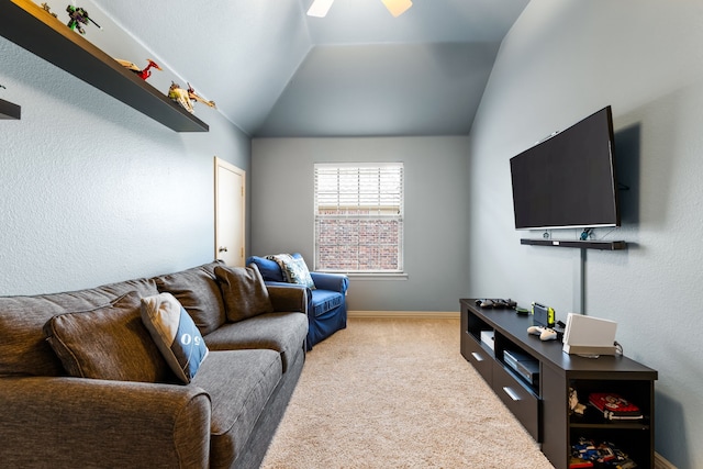 1765 Mustang Trl, Frisco, TX 75033 - living area featuring carpet flooring, ceiling fan, lofted ceiling, and baseboards