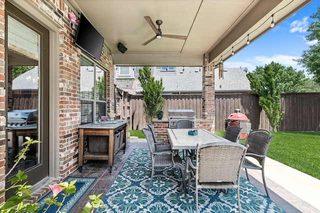 1765 Mustang Trl, Frisco, TX 75033 - fenced backyard featuring a patio, ceiling fan, and outdoor dining space