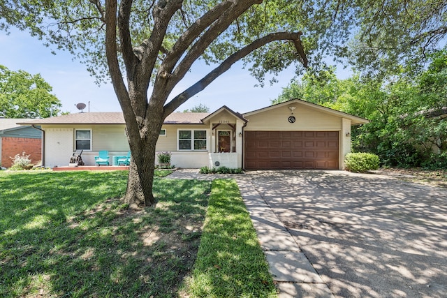 12305 Sunland St, Dallas, TX 75218 - ranch-style house featuring a garage, concrete driveway, a front yard, and brick siding