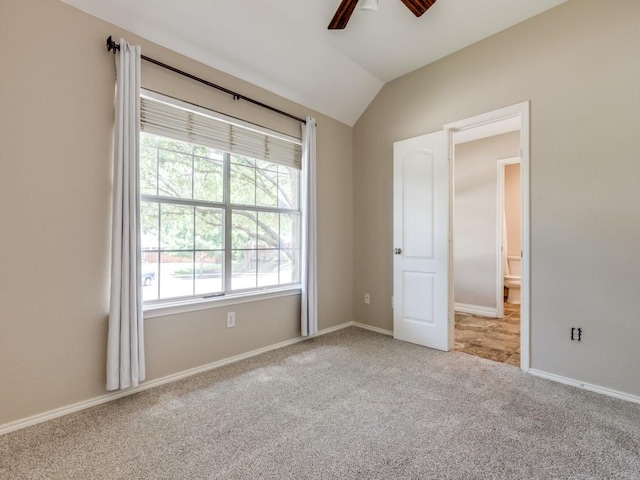 6500 Bolliger Ct, Frisco, TX 75035 - unfurnished bedroom with vaulted ceiling, carpet, baseboards, and ceiling fan