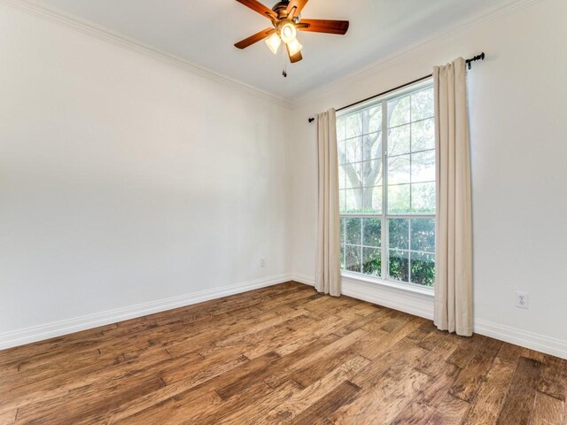 6500 Bolliger Ct, Frisco, TX 75035 - spare room featuring ceiling fan, stairway, wood finished floors, baseboards, and crown molding