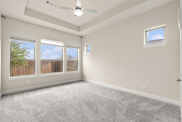 1725 Rolling Heights Ln, Fort Worth, TX 76008 - carpeted empty room with baseboards, ceiling fan, and a raised ceiling