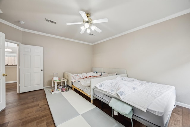 4077 Truman Dr, Frisco, TX 75034 - bedroom featuring wood finished floors, ornamental molding, baseboards, and a ceiling fan