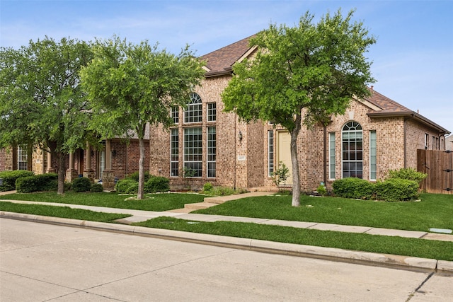4077 Truman Dr, Frisco, TX 75034 - obstructed view of property with brick siding and a shingled roof