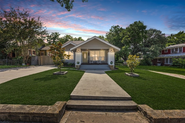 3208 Travis Ave, Fort Worth, TX 76110 - view of front of property with a porch and a lawn