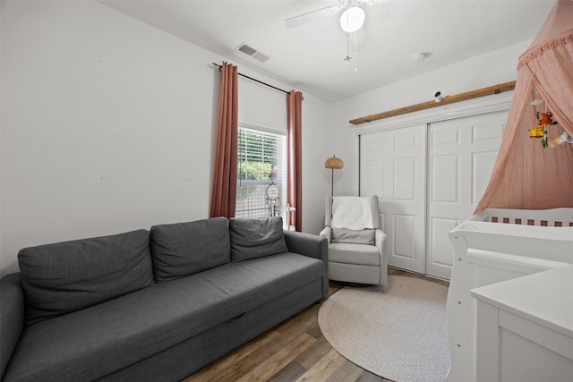 3208 Travis Ave, Fort Worth, TX 76110 - bedroom featuring wood finished floors, a closet, and ceiling fan