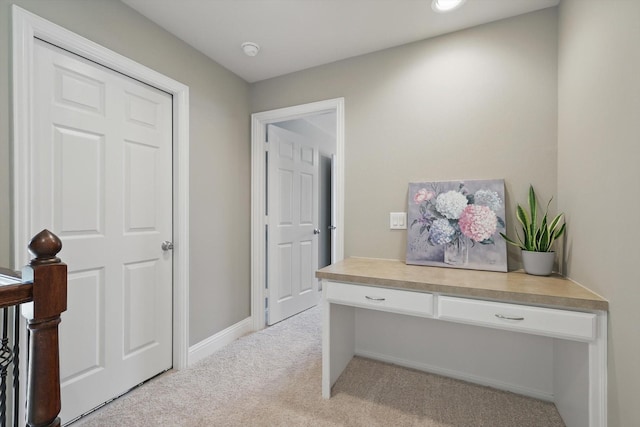 2453 Sir Lovel Ln, Lewisville, TX 75056 - hallway with light carpet, an office area, and baseboards