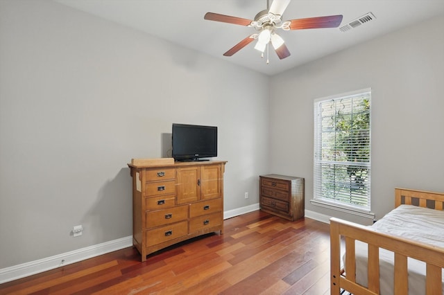 2453 Sir Lovel Ln, Lewisville, TX 75056 - bedroom with hardwood / wood-style floors, baseboards, and ceiling fan