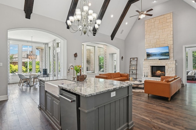 4064 Covent Garden Ln, Frisco, TX 75034 - kitchen featuring a chandelier, gray cabinets, a sink, arched walkways, and beam ceiling