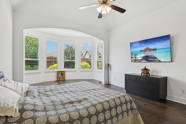 4064 Covent Garden Ln, Frisco, TX 75034 - bedroom with wood finished floors, baseboards, a ceiling fan, and arched walkways