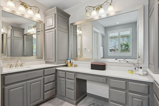 4064 Covent Garden Ln, Frisco, TX 75034 - full bathroom with double vanity and wood finished floors