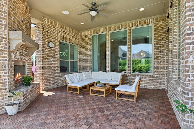 4064 Covent Garden Ln, Frisco, TX 75034 - view of patio featuring ceiling fan and an outdoor living space with a fireplace
