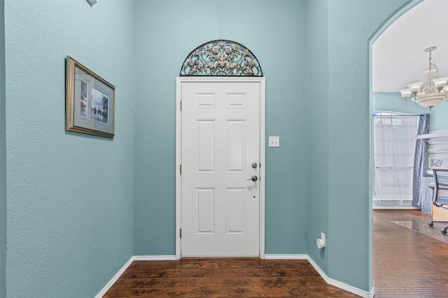 2122 Quail Ridge Dr, Weatherford, TX 76087 - entryway with a chandelier, wood finished floors, and a textured wall