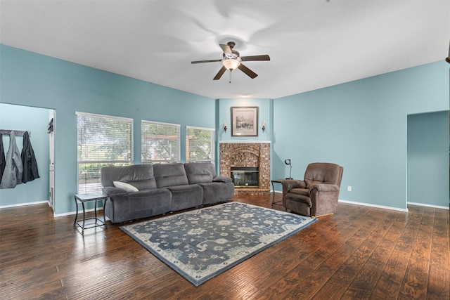 2122 Quail Ridge Dr, Weatherford, TX 76087 - living room featuring ceiling fan, a brick fireplace, healthy amount of natural light, and wood finished floors